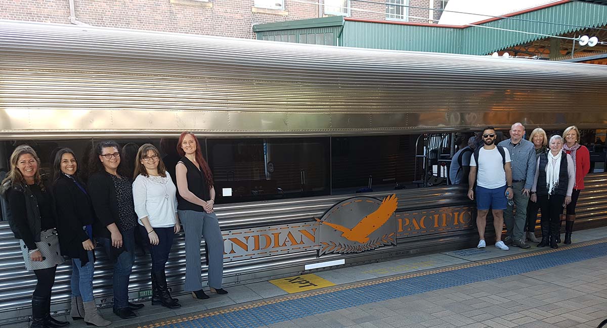 Team standing next to Indian Pacific