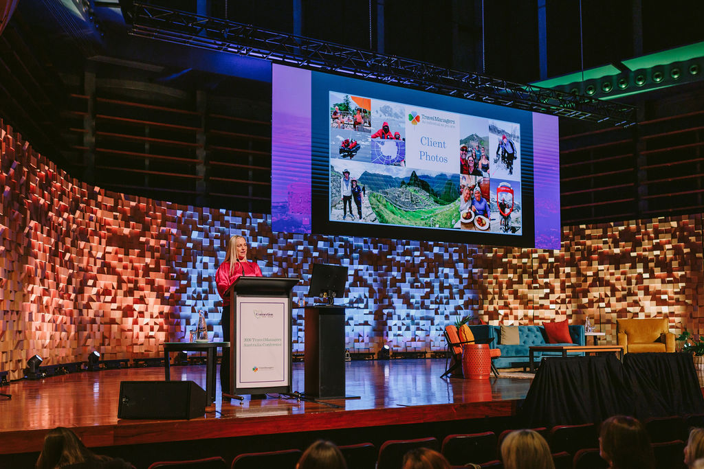 presentation on stage at a conference