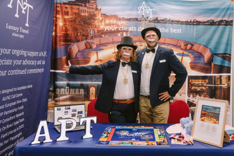 man and woman dressed up at a trade show