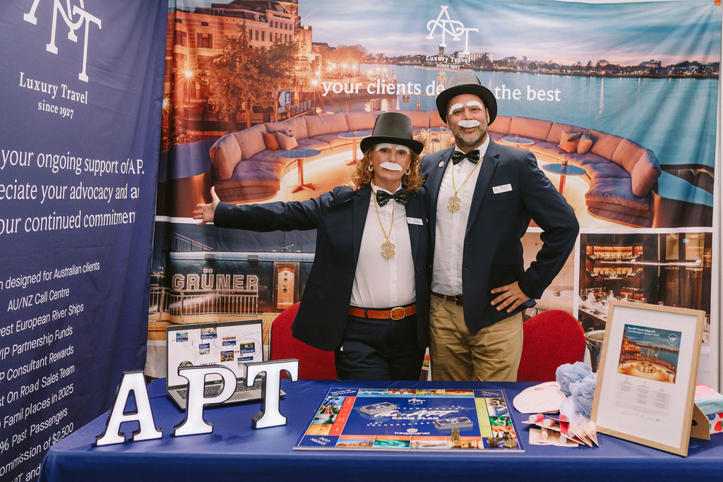 man and woman dressed up at a trade show