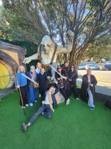 group of personal travel managers at hobbiton, NZ